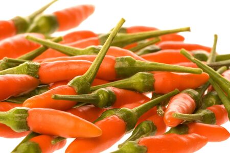 Isolated macro image of baby chillies.の写真素材