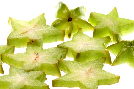 Isolated macro image of sliced carambola or commonly known as star fruits.の写真素材