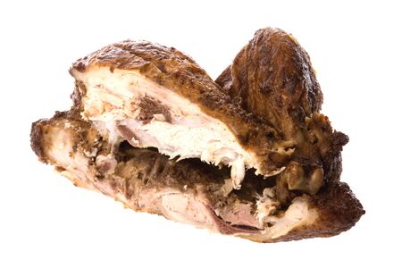 Isolated image of a roasted chicken half.の写真素材