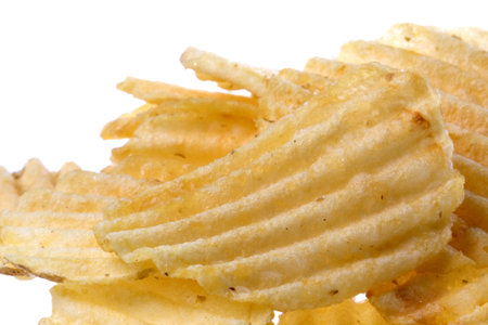 Isolated macro image of potato chips.