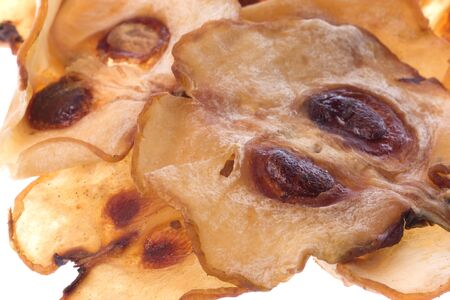 Isolated macro image of dried tamarind slices.の写真素材