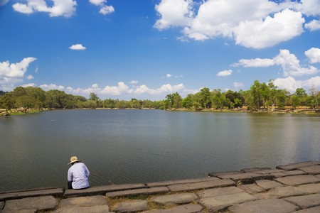 Image of the moat at UNESCO's World Heritage Site of Angkor Wat, located at Siem Reap, Cambodia.の写真素材