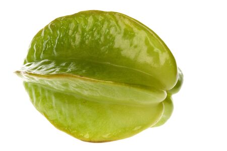 Isolated macro image of a carambola or commonly known as a star fruit.の写真素材