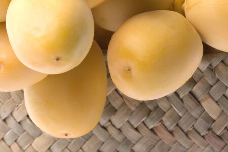 Isolated macro image of fresh dates.の写真素材
