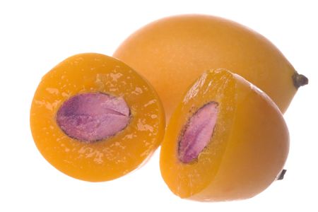 Isolated macro image of tropical mango plums or Kundang as known in Malaysia.の写真素材
