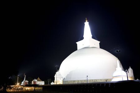 Night image of UNESCO's World Heritage Site of Ruvanveli Dagoba, located at Anuradhapura, Sri Lanka. Ruvanveli Dagoba is the pride of the Great Emperor Dutugamunu. Raised in the 2nd century B.C. this dagoba is supposed to have the perfect water bubble shaの写真素材