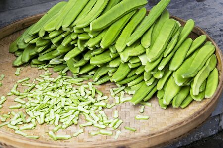 Image of Sword Beans, also known as Big jack Beans, being sun dried at Guilin, China.の写真素材