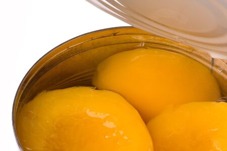 Isolated image of canned peaches in syrup.の写真素材