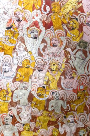 Image of ancient Buddhism inspired painting on a ceiling of a cave at the ancient Rock Temple, Dambulla, Sri Lanka. This is a UNESCO World Heritage Site.の写真素材