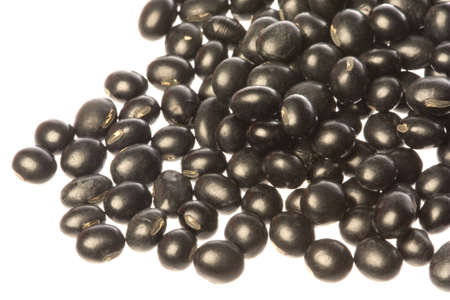 Isolated macro image of organic black beans.の写真素材