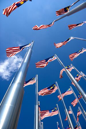 Image of Malaysian flags, also known as Jalur Gemilang, flying high.の写真素材
