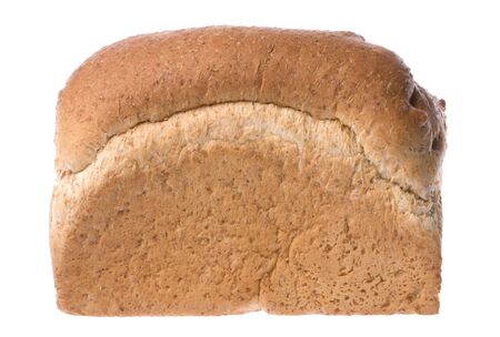Isolated image of a freshly baked loaf of wheat bran bread.の写真素材
