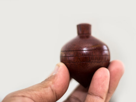 The gasing are traditional toys in the Malaysia, played individually and in pairs
