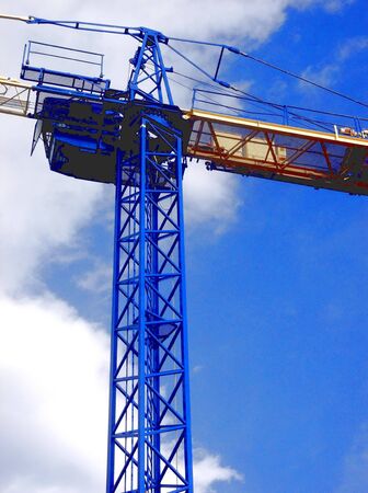 blue and yellow crane の写真素材