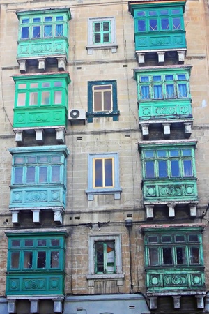 multiple wooden green balconiesの写真素材