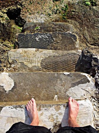 feet on beach stairsの写真素材
