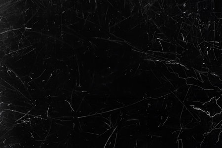 Dark scratched grunge background, old film effect, dusty textureの写真素材