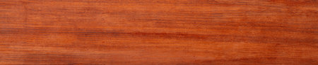 Close-up of Natural Red Wood Grain Textureの写真素材
