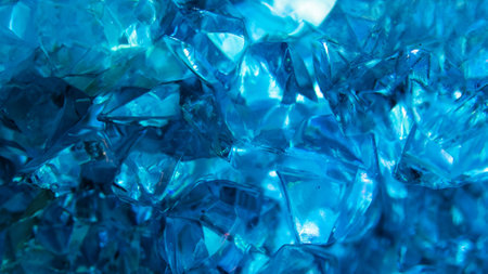 Close-Up of Bright Blue Glass Crystals with Blurred Backgroundの写真素材