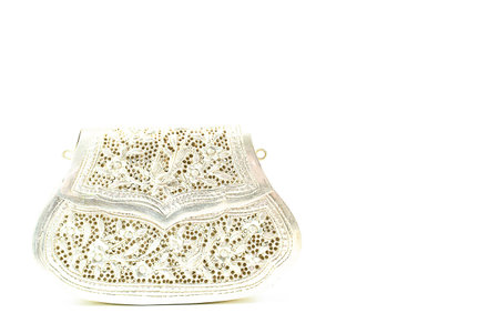 Vintage lady silver clutch handcraft carving handbag on white backgroundの写真素材