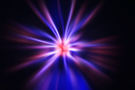 Purple pink blue on black spiral starburst abstract backgroundの写真素材