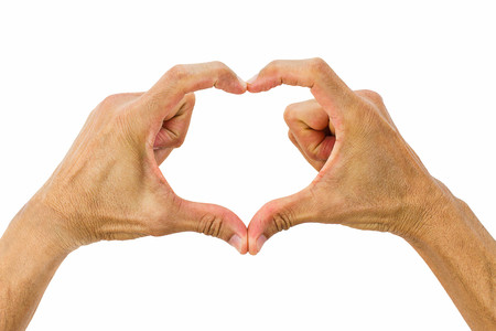 Hands making heart shaped sign isolated on white backgroundの写真素材