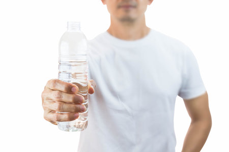 Man holding drinking water bottle isolated on white background