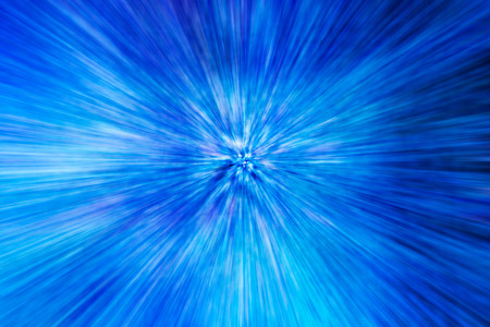 Zoom blurred blue light abstract backgroundの写真素材