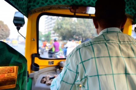 Passengers view in an Indian rickshawの素材