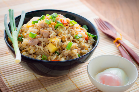 Fried Rice Thailand and boiled egg on wooden tableの写真素材