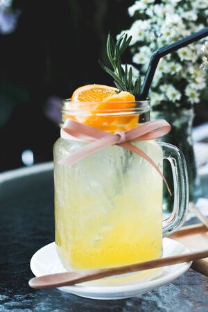 tropical juice. mango and orange mix fruits.の写真素材