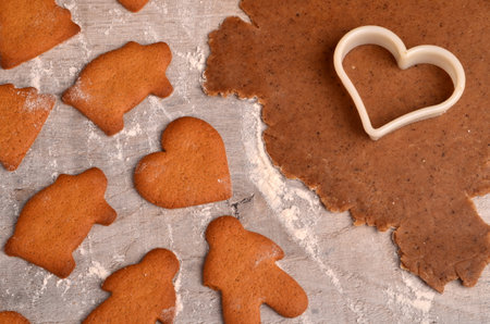 Flat rolled Raw gingerbread dough for cooking Christmas cookies, top view, Gingerbread dough background. Prepare Christmas gingerbread cookiesの写真素材