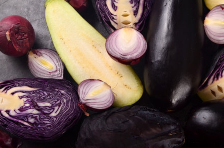 Still life of fresh purple vegetables on a gray background. Collection of fresh purple vegetables, Vegetable backgroundの写真素材