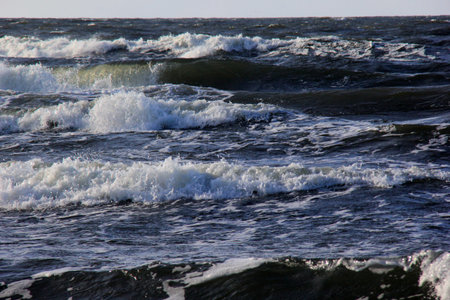 Seascape during a storm with big waves, close-up, Carnikava, Latvia. Big and powerful sea waves...
