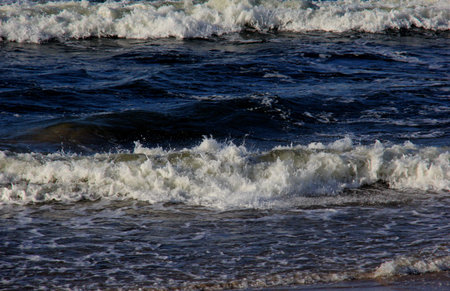 Seascape during a storm with big waves, close-up, Carnikava, Latvia. Big and powerful sea waves...