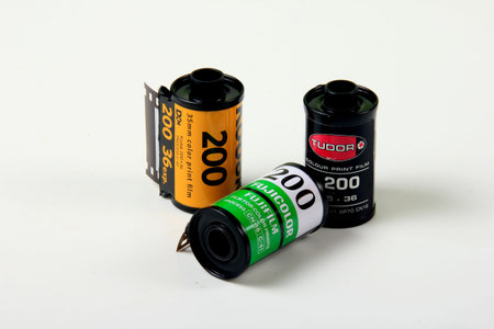 Riga, Latvia - november 07, 2021: Variety of Old Photo Films Cassettes on White Background. Used...