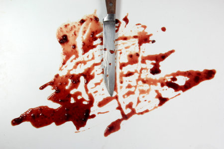 Real Red blood and knife on white background, Knife in bloodの写真素材