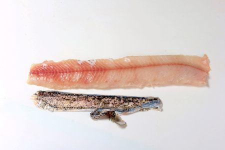 How to make pike fillets with a knife. process on a white background