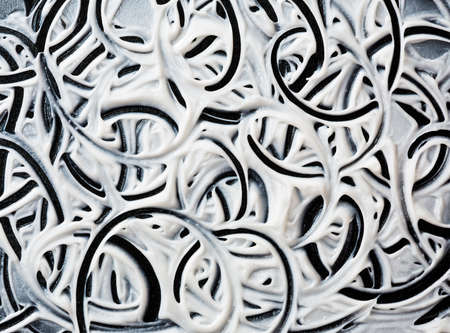 Structural plaster white on a black background. White Cream. paint smear.の写真素材