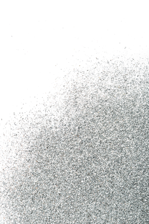 Background of the silver sparkles on white.の写真素材