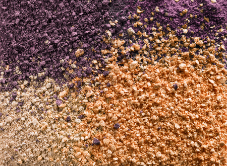 Cosmetic background from scattered multi-colored eyeshadow and blush for the face.の写真素材