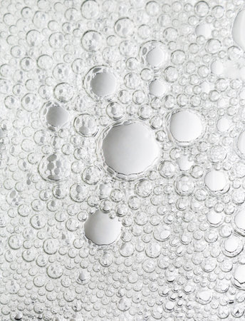 Abstract neutral background from numerous bubbles in water.