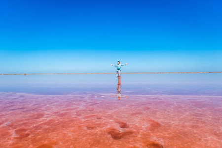 The salty pink lake. The water looks pink due to a special algae that grows in high levels of salt.の写真素材