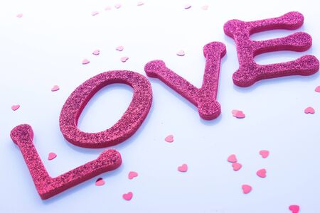 Red sparkly letters spelling out the word loveの写真素材