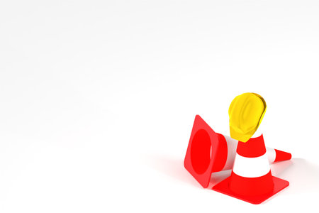 Traffic cones with yellow safety helmet on white background, symbol of construction, work zone safety, and caution warning.の写真素材