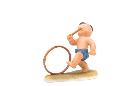 Traditional Thai Child is playing game on Isolate Backgroundの写真素材