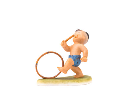 Traditional Thai Child is playing game on Isolate Backgroundの写真素材