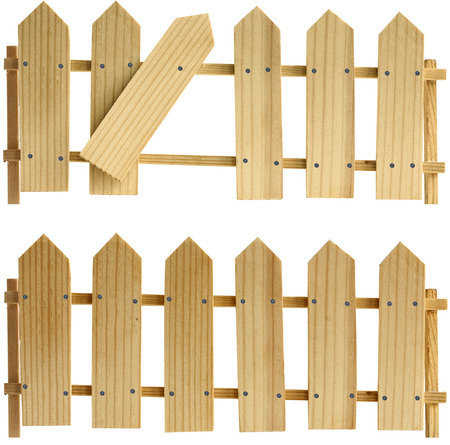 two fences. One of the planks in the fence is bentの写真素材