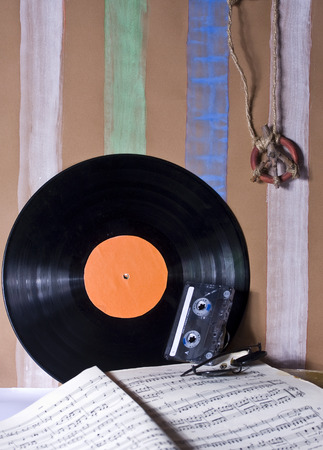 Hippies Still Life with notes Pacific, plate and wallpaperの写真素材