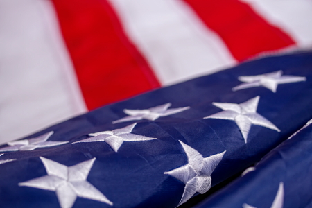 Beautifully waving star and striped American flagの写真素材